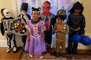 little children with halloween costumes